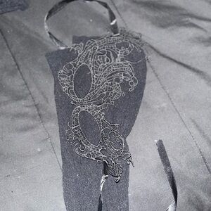 Elegant Black Dress with Intricate Design